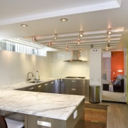 View of kitchen with lime-green cabinetry, marble benchtops, architecture, ceiling, countertop, interior design, kitchen, real estate, room, gray