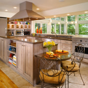 Designer Trudy McGinnis used Viking appliances in a cabinetry, countertop, cuisine classique, interior design, kitchen, brown, gray