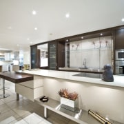 A dsitinctive, mixed material palette features in this countertop, cuisine classique, interior design, kitchen, real estate, gray