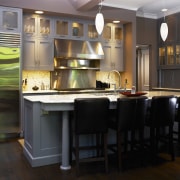 Three rooms were combined to create the kitchen. cabinetry, countertop, cuisine classique, dining room, interior design, kitchen, room, black
