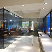 Newly introduced glass walls front the master bedroom ceiling, glass, interior design, lobby, real estate, window, gray