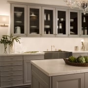 Image of a showroom kitchen at the A&amp;D cabinetry, countertop, cuisine classique, furniture, interior design, kitchen, brown, orange