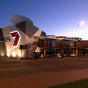 The Channel Seven studio and offices compenstae for architecture, building, city, downtown, dusk, evening, lighting, night, residential area, sky, structure, red, blue