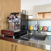 Kitchen designer Shane George suggests considering a coffee countertop, interior design, kitchen, real estate, room, white