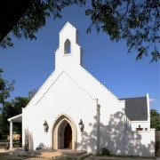 Exterior view of an original 1920s church building, architecture, building, chapel, church, estate, facade, home, house, mission, parish, place of worship, real estate, sky, spanish missions in california, steeple, tree, blue