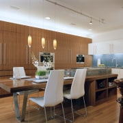 The kitchen features parallel walls of walnut cabinetry, ceiling, dining room, furniture, interior design, kitchen, room, table, wood, brown, gray