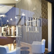 Image of a metal screen from Chaincraft that architecture, ceiling, glass, interior design, lobby, wall, window