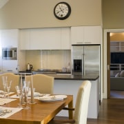 View of the kitchen and dining area which interior design, kitchen, real estate, room, gray, brown