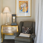 The art collection includes works by Australian and bedroom, blue, chair, couch, furniture, home, house, interior design, living room, room, table, wall, yellow, gray