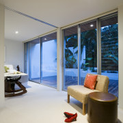 View of the bedroom with floor-to-ceiling windows and architecture, ceiling, floor, interior design, real estate, room, suite, wall, window, wood, gray