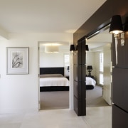 view of master bedroom which features bedroom linen, ceiling, floor, flooring, interior design, property, real estate, room, gray, black