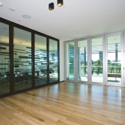 View of the Abigroup offices which features blackbutt door, floor, flooring, hardwood, interior design, laminate flooring, property, real estate, room, window, wood, wood flooring, gray