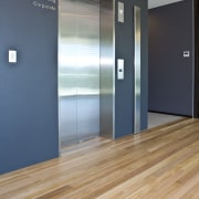 View of the Abigroup offices which features blackbutt door, floor, flooring, hardwood, laminate flooring, real estate, wood, wood flooring, orange