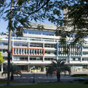 Image of the Centenary Square offices in Brisbane architecture, building, campus, city, commercial building, condominium, corporate headquarters, daytime, facade, headquarters, metropolitan area, mixed use, real estate, tree, black