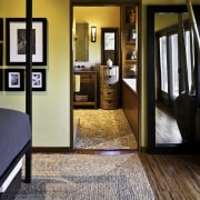 View of master bedroom with ensuite in the carpet, door, floor, flooring, hardwood, interior design, laminate flooring, living room, real estate, room, wood, wood flooring, brown