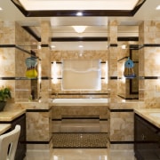View of the master bathroom which is entered bathroom, countertop, interior design, room, orange, brown