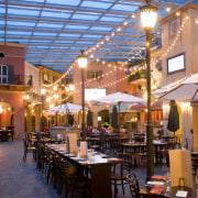 View of a restaurant which was designed and city, downtown, evening, mixed use, restaurant