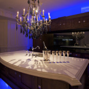 Image of a kitchen from Clive Christian which ceiling, dining room, function hall, home, interior design, light fixture, lighting, restaurant, room, table, black, red