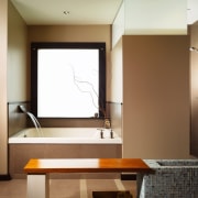 View of the master bathroom featuring mosaic sculptural ceiling, furniture, interior design, room, table, wall, brown, white