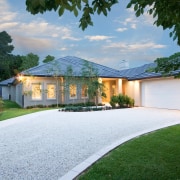 Exterior view of a family home which was architecture, backyard, cottage, elevation, estate, facade, home, house, landscape, landscaping, mansion, property, real estate, residential area, roof, villa, yard, white, green