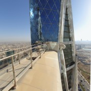 The Bahrain World Centre has a unique shape architecture, bridge, building, cable stayed bridge, daytime, extradosed bridge, fixed link, landmark, metropolitan area, sky, skyscraper, structure, suspension bridge, tower, orange