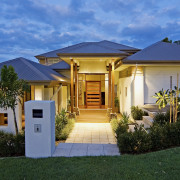 Coomera Waters in the burgeoning Brisbane to Gold cottage, elevation, estate, facade, home, house, lighting, mansion, property, real estate, residential area, roof, villa, teal