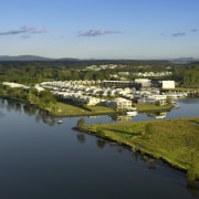 Coomera Waters in the burgeoning Brisbane to Gold aerial photography, bank, bird's eye view, cloud, floodplain, lake, loch, mount scenery, reflection, reservoir, river, sky, suburb, water, water resources, waterway, wetland, teal, brown