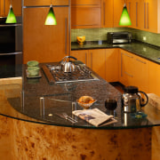 The focal point of this kitchen is the countertop, interior design, kitchen, room, under cabinet lighting, brown