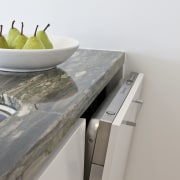 A fully intergrated kleenmaid dishwasher is out of countertop, furniture, product design, sink, table, tap, gray, white
