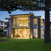 Expansive  glazing and cantilevered balconies maximise the architecture, building, cottage, estate, facade, grass, home, house, lighting, mansion, property, real estate, residential area, villa, window, black, green