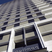 Exterior view of the Pullman hotel where the architecture, building, commercial building, condominium, corporate headquarters, daylighting, daytime, facade, headquarters, landmark, line, metropolis, metropolitan area, skyscraper, tower block, urban area, gray