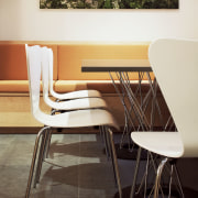 View of kitchen which features a separated living chair, floor, flooring, furniture, hardwood, interior design, product design, table, wall, wood, wood flooring, black, white