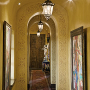 Image of hallway which has been strongly influenced arcade, arch, ceiling, home, interior design, lighting, lobby, wall, window, brown, orange
