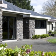 To enhance the country setting of this renovated cottage, estate, facade, home, house, property, real estate, siding, window