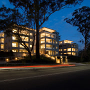 Hope style apartments located in Wahroonga on Sydney's architecture, building, car, city, commercial building, condominium, corporate headquarters, daytime, downtown, dusk, evening, facade, headquarters, home, house, landmark, light, lighting, metropolis, metropolitan area, mixed use, neighbourhood, night, plant, real estate, reflection, residential area, sky, suburb, tree, black, blue