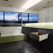 Image of handcrafted stone vessel sinks from Red bathroom, floor, flooring, interior design, property, real estate, room, tile, gray, black