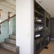 View of a stairway with a glass ballustarde interior design, white