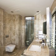 View of the master bathroom with floor-to-ceiling marble, bathroom, ceiling, countertop, floor, flooring, home, interior design, real estate, room, sink, tile, wall, gray