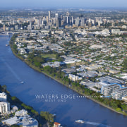 The Waters Edge Developments are set on the aerial photography, bird's eye view, city, cityscape, daytime, metropolis, metropolitan area, photography, river, sky, skyline, suburb, urban area, water, water resources, waterway, blue