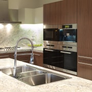 This kitchen in the new Lucient apartments in cabinetry, countertop, interior design, kitchen, brown