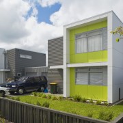 This Housing New Zealand Devlopment features modular homes, architecture, building, elevation, facade, home, house, property, real estate, residential area, white