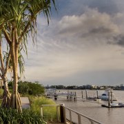 Images of the interior and exterior of Brisbanes condominium, home, mixed use, neighbourhood, property, real estate, residential area, sky, suburb, waterway, gray