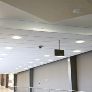 View of Auckland Airport's new international terminal where architecture, ceiling, daylighting, floor, interior design, line, roof, structure, wall, gray