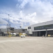 All lighting and power installation at the new airport, airport terminal, asphalt, corporate headquarters, infrastructure, real estate, sky, gray, white