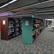 This library at the University of Sydney features institution, library, library science, organization, public library, black, gray