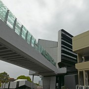 view of the Sydney University's City Road pedestrian architecture, building, commercial building, condominium, corporate headquarters, facade, metropolitan area, mixed use, residential area, skyway, structure, white, black