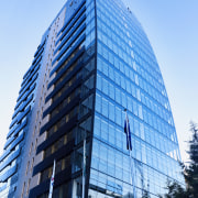 Interior view of apartments in the Lucient residential architecture, building, city, commercial building, condominium, corporate headquarters, daytime, facade, headquarters, metropolis, metropolitan area, mixed use, sky, skyscraper, tower block, urban area, teal, blue