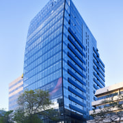 Exterior view of the Lucient apartments in Melbourne architecture, building, city, commercial building, condominium, corporate headquarters, daytime, downtown, facade, headquarters, hotel, landmark, metropolis, metropolitan area, mixed use, neighbourhood, real estate, reflection, residential area, sky, skyscraper, tower, tower block, urban area, teal