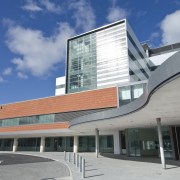 The new Wellington Regional Hospital was designed by architecture, building, commercial building, corporate headquarters, daytime, facade, headquarters, sky, gray, blue