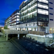Exterior view of the Bendigo Bank sustainable building apartment, architecture, building, city, commercial building, condominium, corporate headquarters, facade, headquarters, home, hotel, house, metropolis, metropolitan area, mixed use, night, real estate, reflection, residential area, sky, tower block, urban area, black, blue